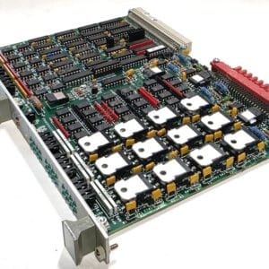 Dense printed circuit board filled with DIP ICs, connectors, and heat sinks.