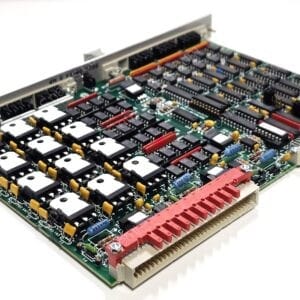 Green printed circuit board densely populated with integrated circuits, capacitors, and a wide red edge connector