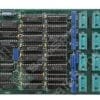 Printed circuit board (ISA-like expansion card) with many DIP ICs and blue connector sockets along the right edge, and a gold edge connector on the left.