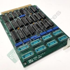 Close-up of a vintage computer expansion board with many DIP ICs and a gold edge connector at the top.