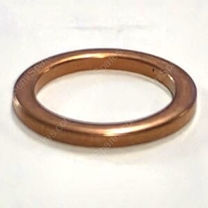 Polished copper ring with a simple, rounded band on a white surface