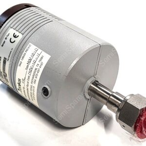 Close-up of a gray industrial electric motor with labeled stickers on its side and a metal output shaft.