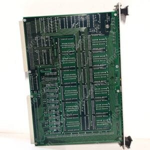 Green printed circuit board viewed from the back, showing dense copper traces and solder joints, with an edge connector along the bottom and metal mounting brackets on the sides.