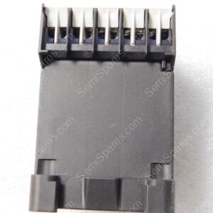 Close-up of a black plastic multi-pin connector with several vertical metal contacts in a row, likely the plug end of a cable assembly.