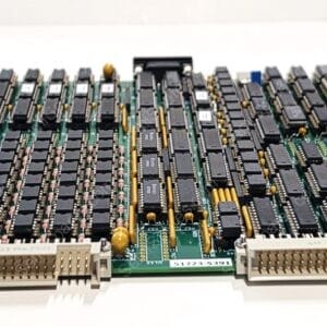 Dense green PCB densely populated with black integrated circuits and yellow capacitors, viewed from above.