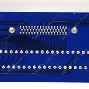 Blue PCB with dense rows of soldered pins along the bottom, silver joints and routed black traces forming curved patterns, likely an old connector plate.
