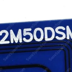 Close-up of a blue surface with white embossed letters '2MODSM' and curved black lines beneath.