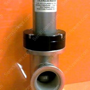 Metal industrial valve assembly with a black collar, warning label on top, and a hollow circular inlet against an orange background.