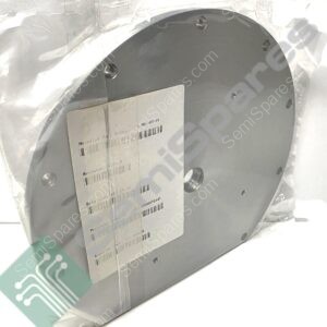 Close-up of a gray circular metal flange with multiple screw holes, tucked in protective packaging with a label and barcode visible on the surface.