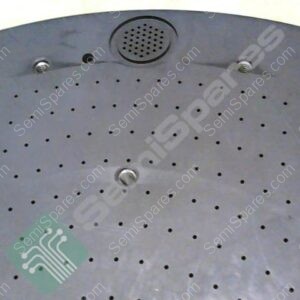 Close-up of a round perforated metal ceiling panel with a small speaker grille at the top.