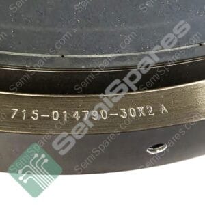 Close-up of a tire sidewall showing embossed size/code text (715-014790-30X2A) and a partial watermark diagonally across the image.