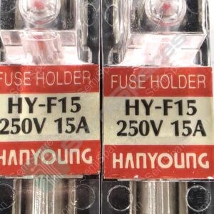 Two fuse holders labeled HY-F15 on a black panel, showing 250V and 15A ratings side by side.