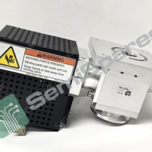 Close-up of a vented black electronic module with a moving parts warning label on the front panel.