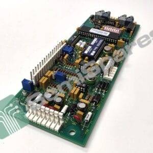 Close-up of a green printed circuit board with many components, connectors, and a white label near the edge.