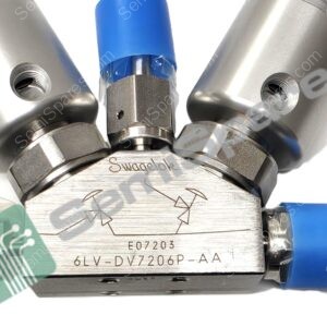Close-up of a Swagelok stainless steel valve assembly with a blue protective cap and engraved part number 6LV-DV7206P-AA on the body.
