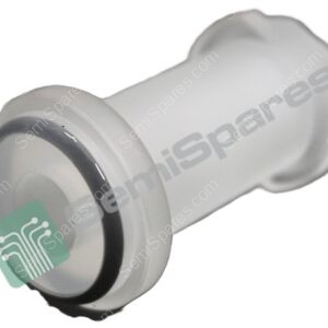 Close-up of a gray cylindrical device with a green label containing circuit-like graphics, oriented at a diagonal.
