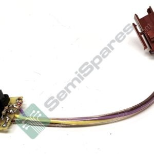 Close-up of a small circuit board with a brown connector and multiple colored wires attached.